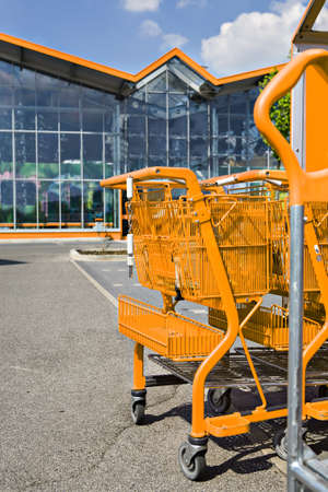 a shot of market cart and supermarket viewの写真素材