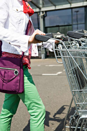 a shot of market cart and supermarket viewの写真素材