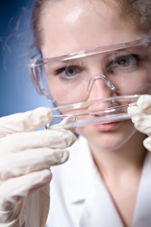 A young female student in the chemical laboratoryの写真素材