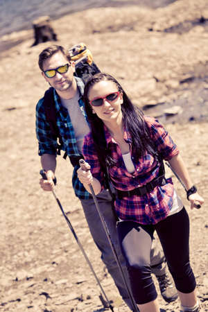 young couple hiking in the wilde nature