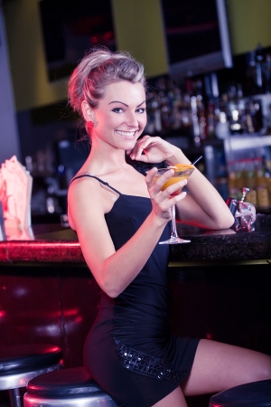 portrait of a young women in the barの写真素材