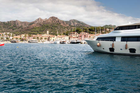 PORTO AZZURO, ELBA ISLAND, ITALY -AUGUST, 2011: Port area in Porto Azzurro on Elba Island, Italy on August, 2011.のeditorial素材