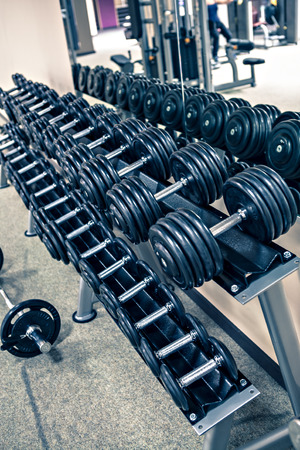diverse equipment and machines at the gym roomの写真素材