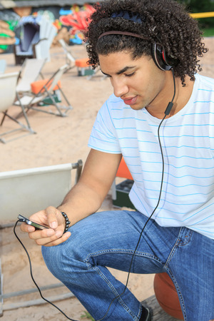 Portrait of a young man on the beachの写真素材