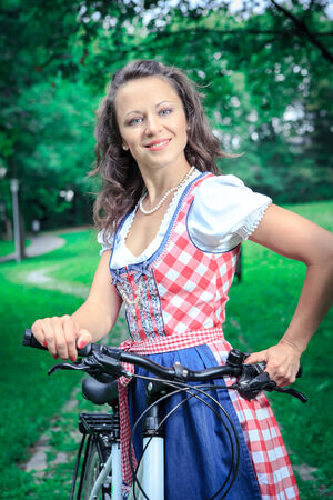 portrait of young bavarian girl in the traditional bavarian costumeの写真素材