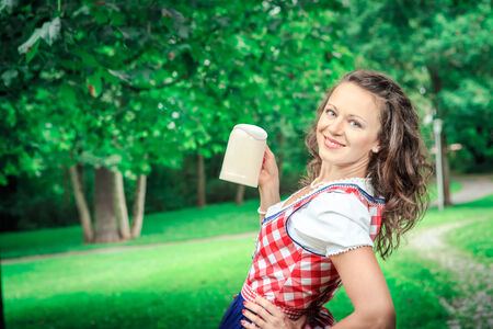 portrait of young bavarian girl in the traditional bavarian costumeの写真素材