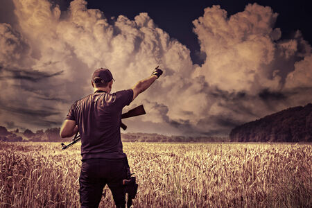 masked militant with a submachine gun by tactical operationの写真素材