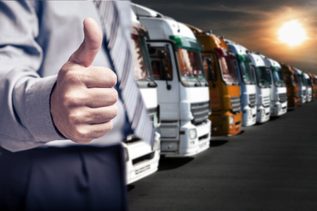 a businessman stick one's thumb in the air for cargo company