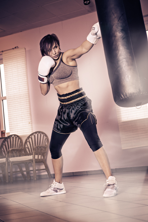 female boxer during training in a gymの写真素材