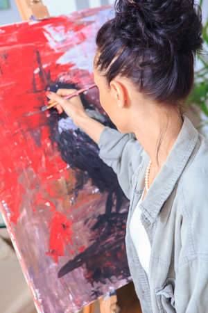 portrait of a female painter at workの写真素材