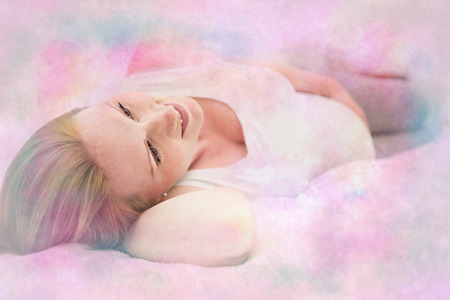 portrait of a pregnant woman at homeの写真素材