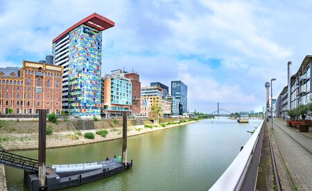 Rhine river boardwalk with view on Dusseldorf city in Germanyのeditorial素材