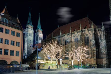 NUREMBERG, GERMANY - CIRCA OCTOBER, 2016: The Hauptmarkt and Frauenkirche of Nuremberg town by night, Germanyのeditorial素材