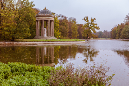 MUNICH, BAVARIA, GERMANY - CIRCA OCTOBER, 2018: The Park of Nymphenburg Palace in fall in Munich, Germanyのeditorial素材