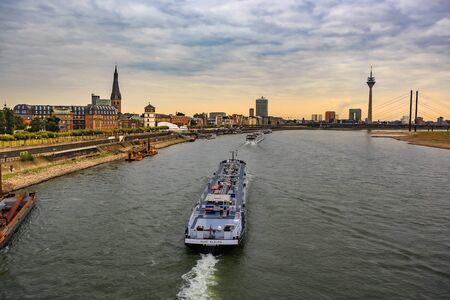 DUSSELDORF, GERMANY - CIRCA SEPTEMBER, 2016: Evening scenes of Dusseldorf and Rhine embankment promenadeのeditorial素材
