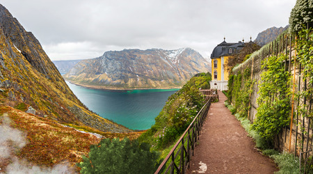 fantasy coastal landscape of an unreal Land with a castle on the rockのeditorial素材