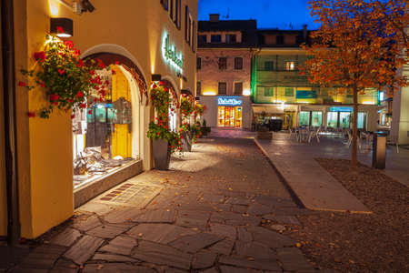 INNICHEN, ITALY - CIRCA OCTOBER, 2010: Innichen town in Dolomite Alps by night, Italy, Europeのeditorial素材