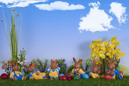 The Easter bunnies are lying in the grass