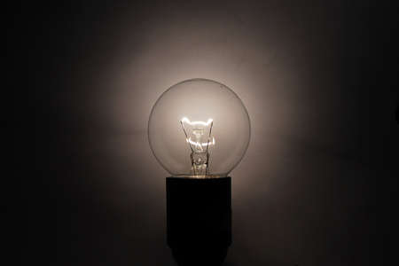 bulb shines in the darknessの写真素材