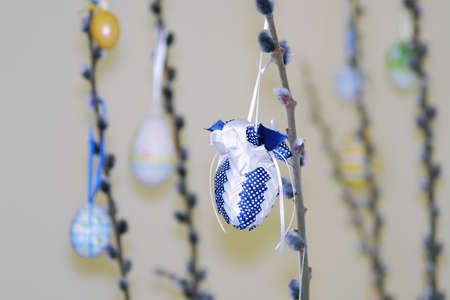 blue decorated Easter egg tree at Easter to celebrate