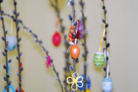 Easter palm tree with many colorful Easter eggs and kittens