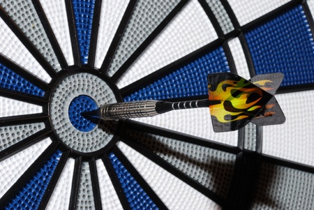 dart arrow hit right in the middle in the targetの写真素材