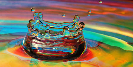 drops impacting view of a colorful liquidの写真素材