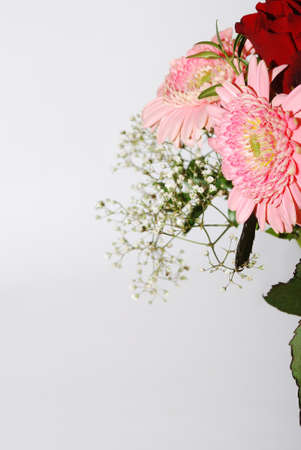 bouquet of fresh colorful flowers portrait view on white backgroundの写真素材