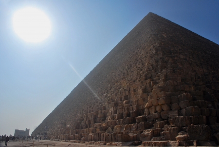 pyramid with many stone in egypt with blue sky and sunbeamの写真素材