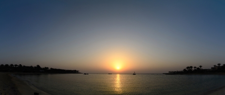 sunrise on the beach and sea on vacation panoramaの写真素材