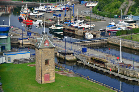 harbor with many colorful buildings and ships in newcastleのeditorial素材