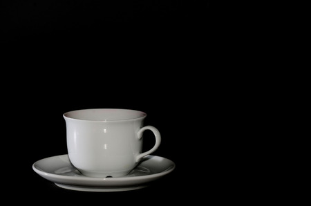blank white cup on black の写真素材