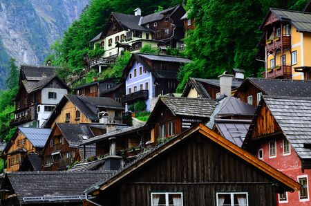colorful old wooden houses in Hallstatt at the lakeの写真素材
