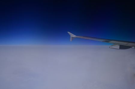 white blue horizon and wing from airplane