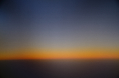 warm sunset view from airplane