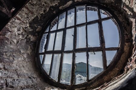 round old window in factory