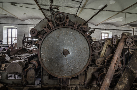 big old machine in abandoned factory