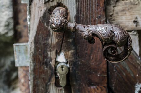 old handle of ornate iron doorの写真素材