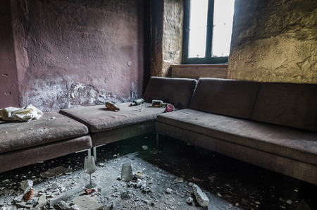 room with glasses and seats in abandoned barの写真素材