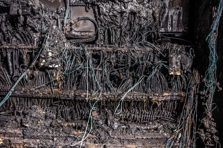 melted switch box after a big fireの写真素材