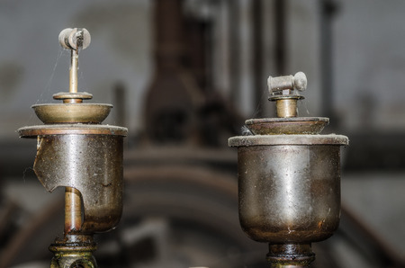 parts of old machine in abandoned factoryの写真素材