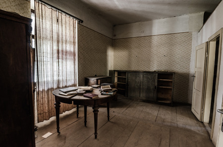 round table with books in roomの写真素材