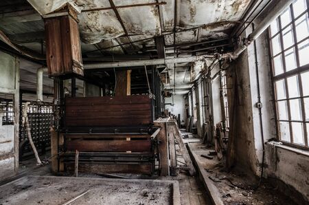 shaft of wood and old machineの写真素材