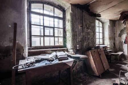desk with folder in old factoryの写真素材