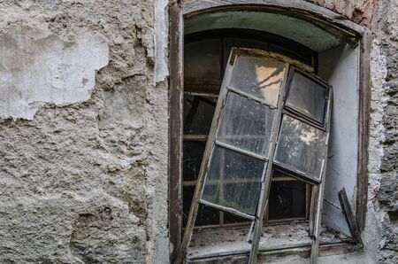 old ruined window of houseの写真素材