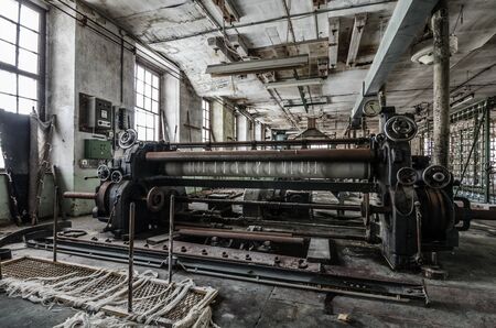 large weaving machine in abandoned factoryの写真素材