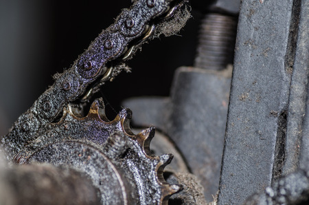 oily old chain driveの写真素材