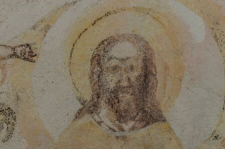 old image of jesus on a wallの写真素材