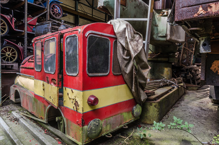 old locomotive of a amusement park in a hall