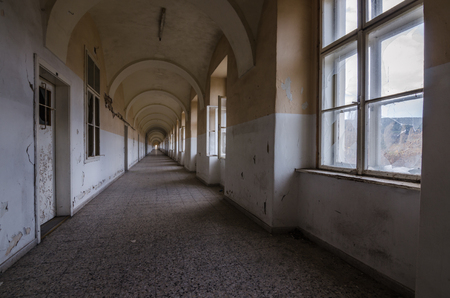 long corridor in abandoned old barracksの写真素材